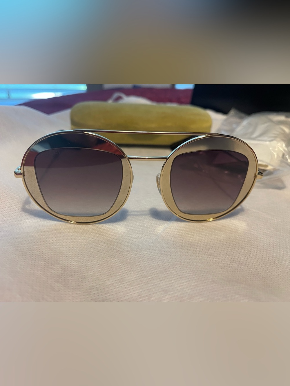 Gucci Gold Round Frame Sunglasses with Gradient Gray Lenses